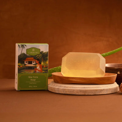 Aloe Vera soap on a wooden stand with packaging in the background